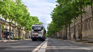 VIDEO Paris, France – June 18, 2024: Different types of transportation moving on the Boulevard Saint-Michel in daylight - Starpik