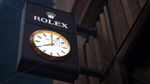 VIDEO Paris, France – June 18, 2024: The sign of the Rolex store in the evening - Starpik