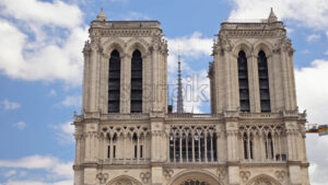 VIDEO The facade of the Cathedrale Notre-Dame de Paris in France with the blue sky on the background - Starpik
