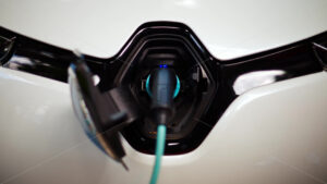 VIDEO Close up of a white electric car charging - Starpik