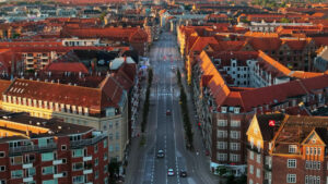 VIDEO – Aerial drone view of Amagerbro area in the northern part of the island Amager in Copenhagen, Denmark at sunset - Starpik