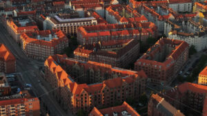 VIDEO – Aerial drone view of Amagerbro area in the northern part of the island Amager in Copenhagen, Denmark at sunset - Starpik