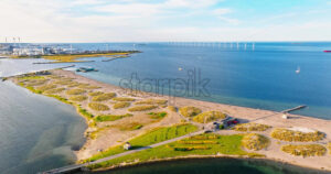 VIDEO Aerial drone view of Amager Beachpark seaside public park in Copenhagen, Denmark - Starpik