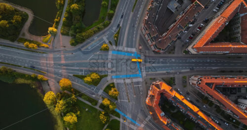 VIDEO Aerial drone view of Amagerbro area in the northern part of the island Amager in Copenhagen, Denmark at sunset - Starpik