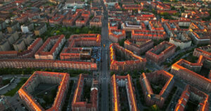 VIDEO Aerial drone view of Amagerbro area in the northern part of the island Amager in Copenhagen, Denmark at sunset - Starpik