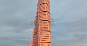 VIDEO Aerial drone view of Turning Torso residential skyscraper in Malmo, Sweden - Starpik