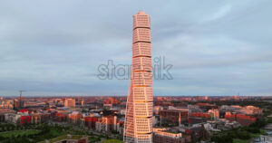 VIDEO Aerial drone view of Turning Torso residential skyscraper in Malmo, Sweden - Starpik