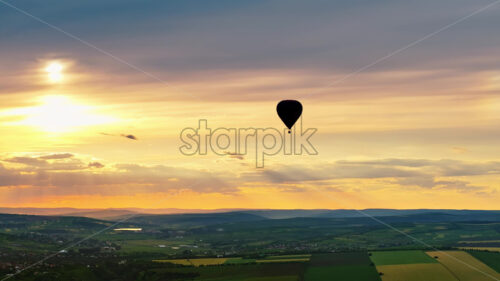 VIDEO Aerial drone view of a hot air balloon flying above Chisinau, Moldova - Starpik