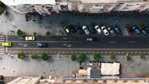 VIDEO Aerial drone view of cars moving in traffic through Bucharest, Romania - Starpik