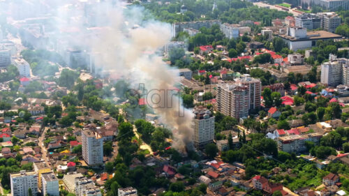 VIDEO Aerial drone view of smoke coming out of a building in Chisinau, Moldova - Starpik