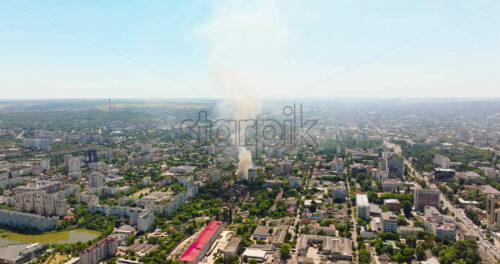 VIDEO Aerial drone view of smoke coming out of a building in Chisinau, Moldova - Starpik