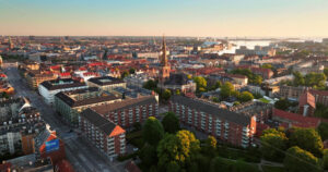 VIDEO Aerial drone view of the Church of Our Saviour in the city centre of Copenhagen, Denmark at sunset - Starpik