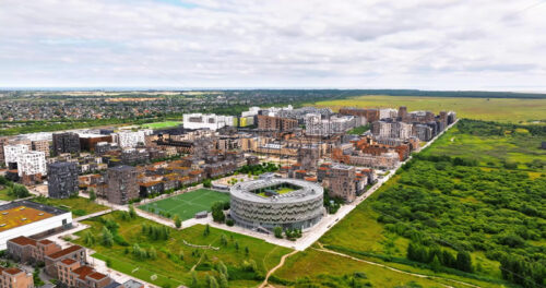 VIDEO Aerial drone view of the Orestad developing city area in Copenhagen, Denmark on the island of Amager - Starpik