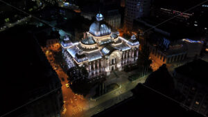 VIDEO Aerial drone view of the Palace of the Deposits and Consignments illuminated in Bucharest, Romania at night - Starpik