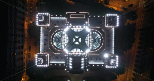 VIDEO Aerial drone view of the Palace of the Deposits and Consignments illuminated in Bucharest, Romania at night - Starpik