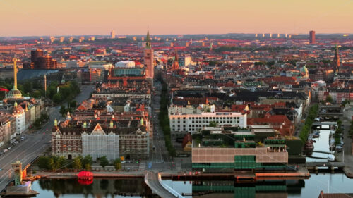 VIDEO Aerial drone view of the city centre of Copenhagen, Denmark at sunset - Starpik