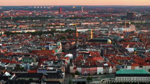 VIDEO Aerial drone view of the city centre of Copenhagen, Denmark at sunset - Starpik