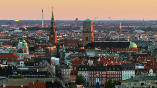 VIDEO Aerial drone view of the city centre of Copenhagen, Denmark at sunset - Starpik