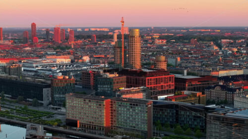 VIDEO Aerial drone view of the city centre of Copenhagen, Denmark at sunset - Starpik