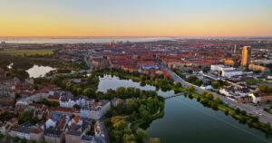 VIDEO Aerial drone view of the city centre of Copenhagen, Denmark at sunset - Starpik