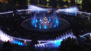 VIDEO Aerial drone view of the illuminated Bucharest fountains in Romania, at night - Starpik