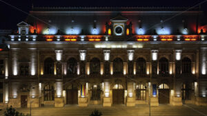 VIDEO Aerial drone view of the illuminated Palace of Justice in Bucharest, Romania, at night - Starpik