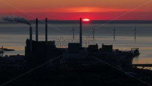 VIDEO Copenhagen, Denmark – July 24, 2024: Aerial drone view of Amager Bakke in Amager at sunset - Starpik