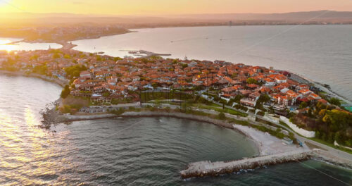 Royalty free stock footage Aerial drone view of the old town Nessebar, Bulgaria at sunset - Starpik