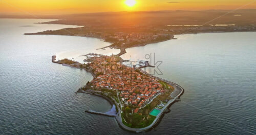 Royalty free stock video Aerial drone view of the old town Nessebar, Bulgaria at sunset - Starpik