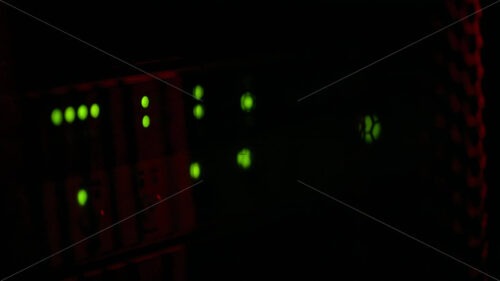 Royalty free stock video Close up of a server with flashing red lights in a data center - Starpik