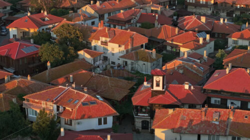 Royalty free video Aerial drone view of the old town Nessebar, Bulgaria at sunset - Starpik