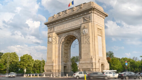 Royalty free video Time lapse of cars moving near the Triumphal Arch of Bucharest, Romania - Starpik