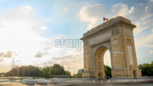 Royalty free video Time lapse of cars moving near the Triumphal Arch of Bucharest, Romania - Starpik