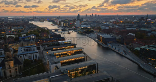 Video Aerial drone view of Borsen historical place in Copenhagen, Denmark at night - Starpik