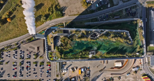 Video Aerial drone view of CopenHill artificial ski slope on the roof of an energy plant - Starpik