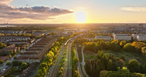 Video Aerial drone view of Vesterbro district in Copenhagen, Denmark at sunset - Starpik