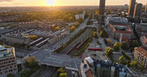 Video Aerial drone view of Vesterbro district in Copenhagen, Denmark at sunset - Starpik