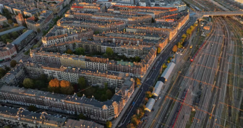 Video Aerial drone view of Vesterbro district in Copenhagen, Denmark at sunset - Starpik