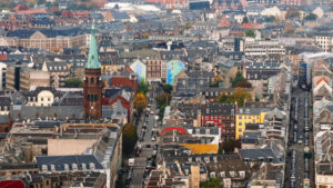 Video Aerial drone view of Vesterbro district in Copenhagen, Denmark in daylight - Starpik