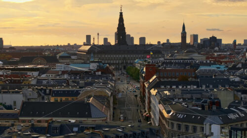 Video Aerial drone view of the Christiansborg Palace on the islet of Slotsholmen in central Copenhagen, Denmark at sunset - Starpik