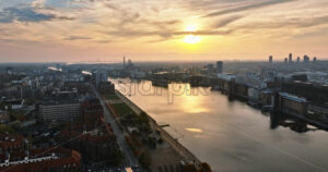 Video Aerial drone view of the Islands Brygge harbourfront area in central Copenhagen, Denmark at sunset - Starpik