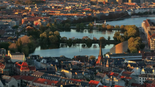 Video Aerial drone view of the Lakes curving around the western margin of the city centre of Copenhagen, Denmark - Starpik