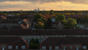 Video Aerial drone view of the Paper Island urban oasis surrounded by water in Copenhagen, Denmark in the evening - Starpik