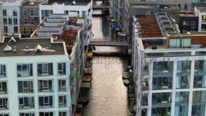 Video Aerial drone view of the Teglholmen peninsula in the South Harbour of Copenhagen, Denmark - Starpik