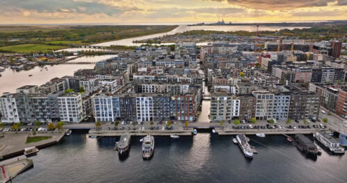 Video Aerial drone view of the Teglholmen peninsula in the South Harbour of Copenhagen, Denmark - Starpik