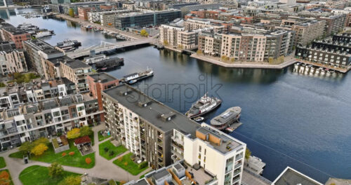 Video Aerial drone view of the Teglholmen peninsula in the South Harbour of Copenhagen, Denmark - Starpik