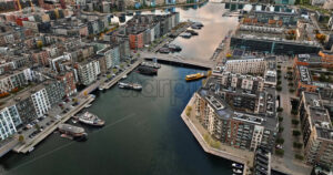 Video Aerial drone view of the Teglholmen peninsula in the South Harbour of Copenhagen, Denmark - Starpik