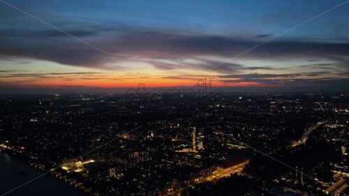 Video Aerial drone view of the city centre of Copenhagen, Denmark at sunset - Starpik