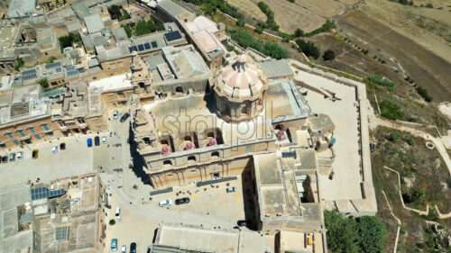 VIDEO Aerial drone view of the walled city of Valletta, Malta, surrounded by the Mediterranean sea in daylight - Starpik