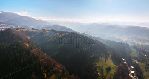 Video Aerial drone view of the Carpathian Mountains, near Brasov, Romania - Starpik